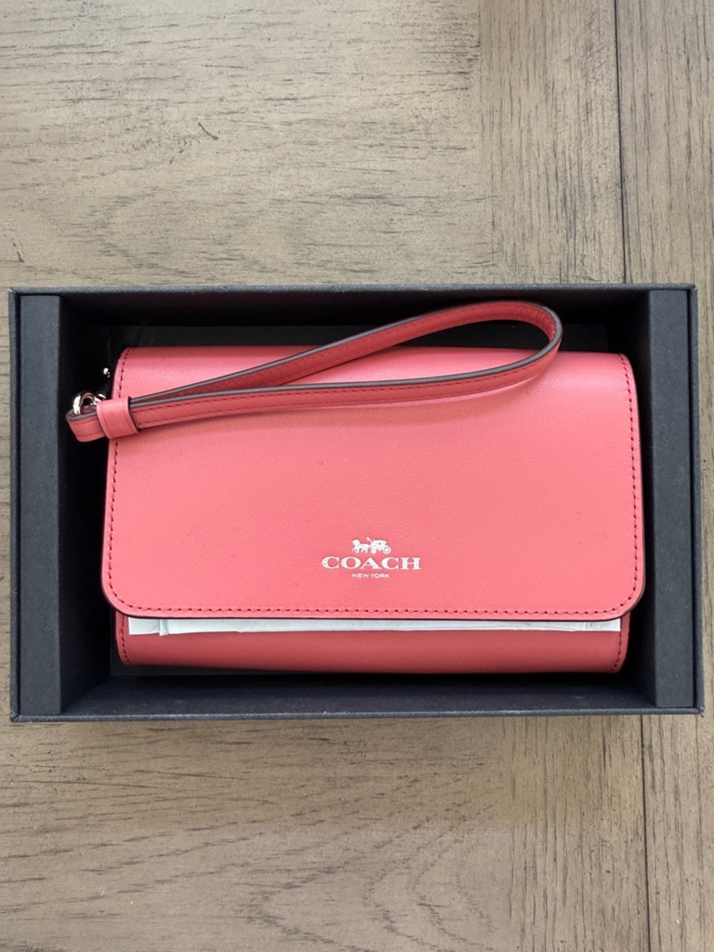 COACH Coral Pink Leather Wristlet with Silver Logo